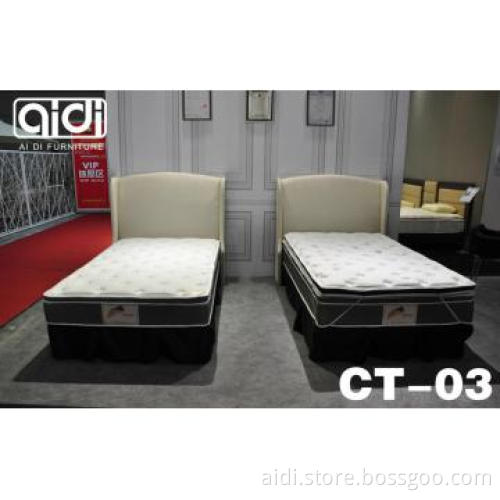 hotel bedroom: mattress,bed,headboad